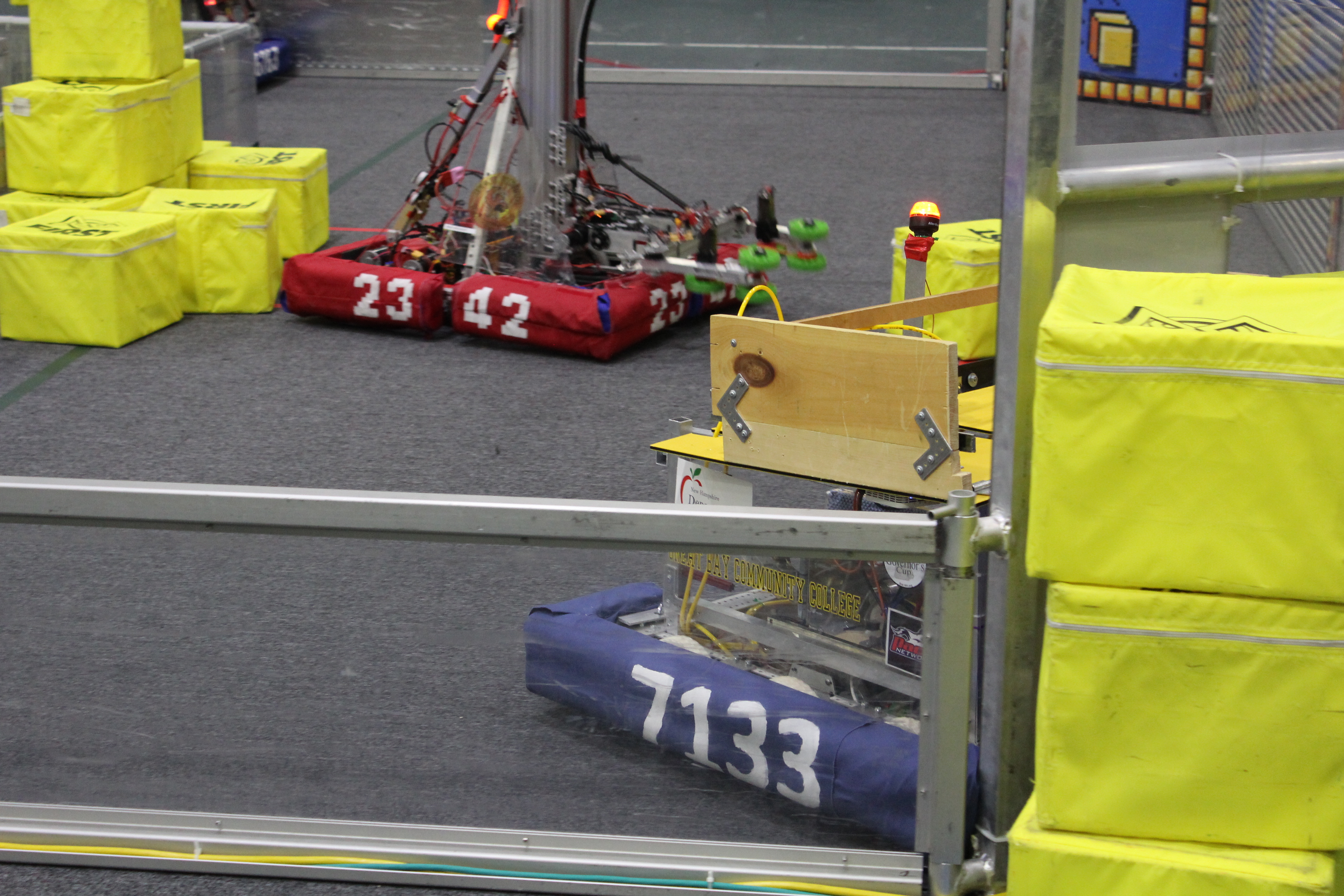 Robot Recieving Cube From Human Player At A Portal